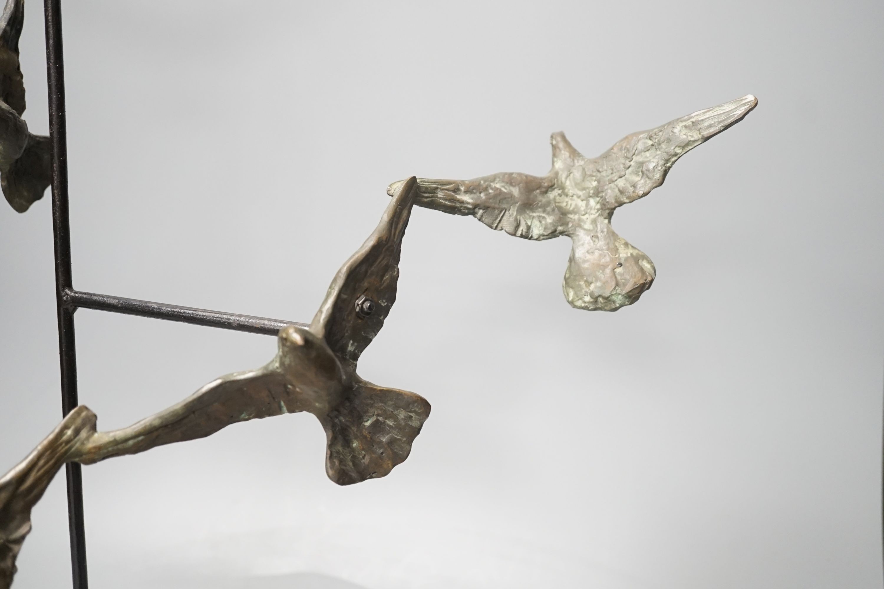 A bronze bird group, ‘Flight’ ‘97, signed Hayter, 55.5 cms high.